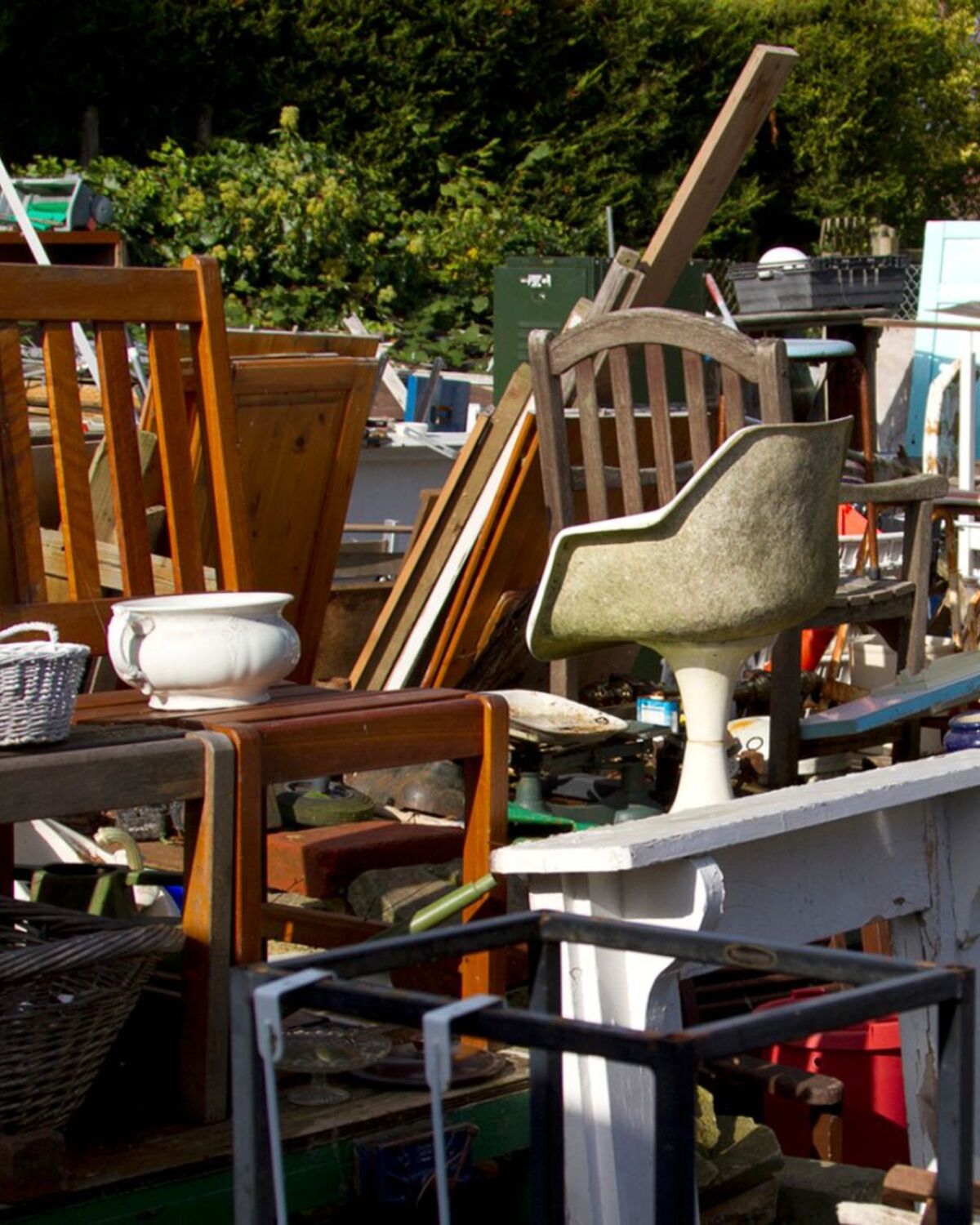 Pile of discarded furniture and household items ready for removal