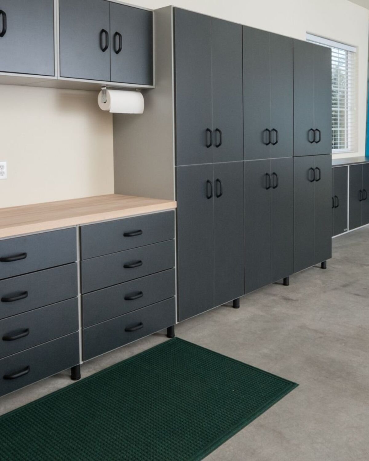 Organized storage space with shelving and stacked contents